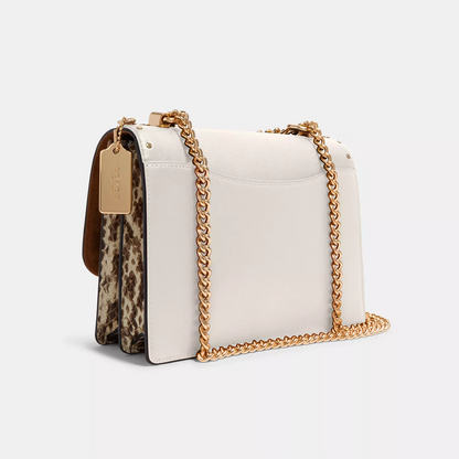 Coach Klare Crossbody Bag In Signature Canvas With Rivets